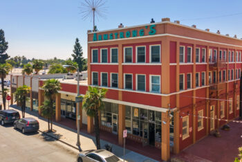 Greg Bedell and Roxy Klein close the sale of the Armstrong Building for $2.98M